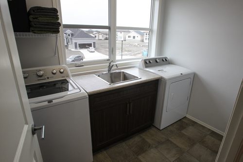 New Home 9 Fairbairn Bay upstairs laundry room 150511 - Monday, May 11, 2015 -  (MIKE DEAL / WINNIPEG FREE PRESS)