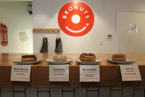 Intersection piece on Bronuts - Winnipeg's first, dedicated gourmet doughnut shop owned by Brett and Dylan - brothers who put the Bro in Bronuts.  The four varieties of donuts available - Nutella Dip, Vanilla Glaze, Peanut Butter Chocolate and Cinnamon Sugar.  May 09, 2015 Ruth Bonneville / Winnipeg Free Press