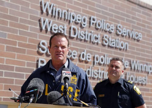 LOCAL POLICE - Media briefing on Project Comet, to combat on-going spikes in property-related crime.  Left to right - Sergeant Mike Brooker and Constable Jason Michalyshen. BORIS MINKEVICH/WINNIPEG FREE PRESS May 12, 2015