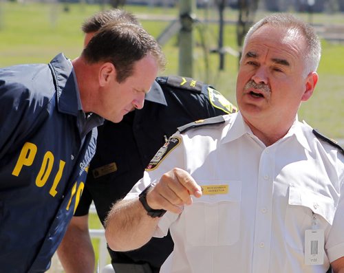 LOCAL POLICE - Media briefing on Project Comet, to combat on-going spikes in property-related crime. (right) Inspector Rick Guyader and Sergeant Mike Brooker (left) BORIS MINKEVICH/WINNIPEG FREE PRESS May 12, 2015