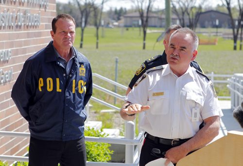 LOCAL POLICE - Media briefing on Project Comet, to combat on-going spikes in property-related crime.  Left to right - Sergeant Mike Brooker and Inspector Rick Guyader. BORIS MINKEVICH/WINNIPEG FREE PRESS May 12, 2015