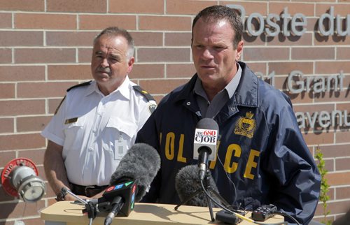 LOCAL POLICE - Media briefing on Project Comet, to combat on-going spikes in property-related crime. Left to right - Inspector Rick Guyader and  Sergeant Mike Brooker. BORIS MINKEVICH/WINNIPEG FREE PRESS May 12, 2015