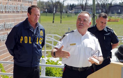 LOCAL POLICE - Media briefing on Project Comet, to combat on-going spikes in property-related crime.  Left to right - Sergeant Mike Brooker, Inspector Rick Guyader, and Constable Jason Michalyshen. BORIS MINKEVICH/WINNIPEG FREE PRESS May 12, 2015
