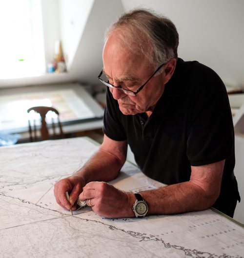 Real Berard, artist, canoe route mapper and political cartoonist at his home in Winnipeg working on one of his many map projects. 150512 - Tuesday, May 12, 2015 -  (MIKE DEAL / WINNIPEG FREE PRESS)