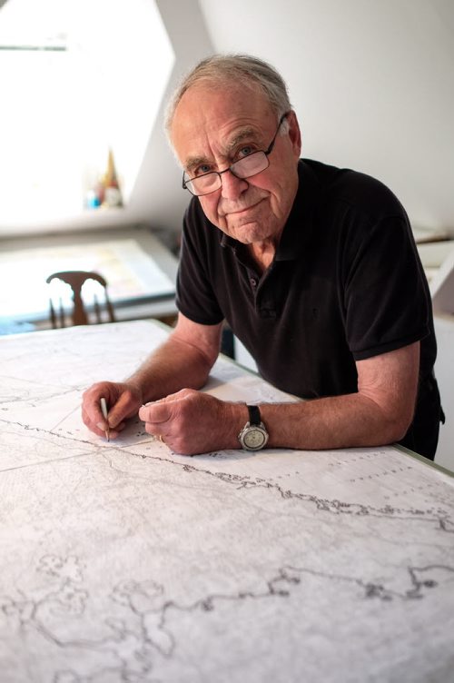 Real Berard, artist, canoe route mapper and political cartoonist at his home in Winnipeg working on one of his many map projects. 150512 - Tuesday, May 12, 2015 -  (MIKE DEAL / WINNIPEG FREE PRESS)