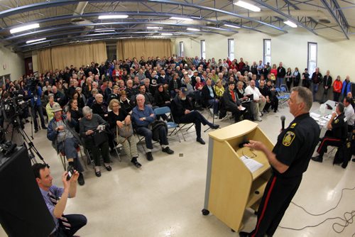 LOCAL - Corydon Community Centre. Police meet with a full house in one of the rooms inside.  BORIS MINKEVICH/WINNIPEG FREE PRESS May 13, 2015