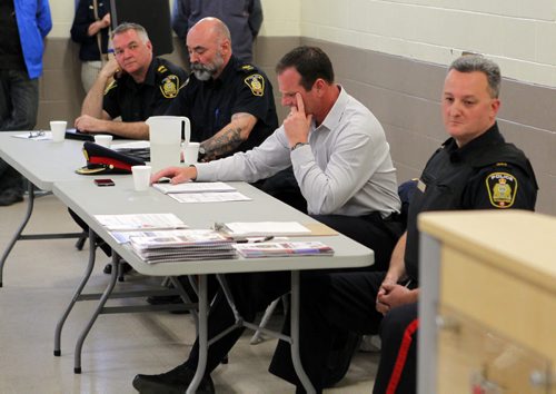 LOCAL - Community meeting on crime in River Heights. Meeting was packed out the door at Corydon Community Centre. Sergeant Mike Brooker, in grey shirt. BORIS MINKEVICH/WINNIPEG FREE PRESS May 13, 2015