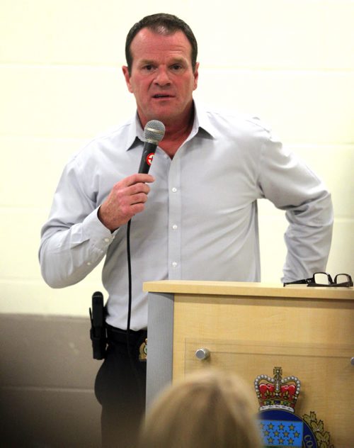 LOCAL - Community meeting on crime in River Heights. Meeting was packed out the door at Corydon Community Centre. Sergeant Mike Brooker, in grey shirt. BORIS MINKEVICH/WINNIPEG FREE PRESS May 13, 2015