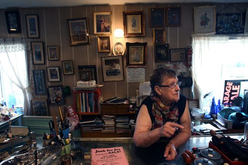 Near Portage La Prairie, Manitoba- Vivian Proden owns Junk for Joy just East of  Portage La Prairie, Manitoba on Hyw. #1 - Vivian, 84, is retiring after 34 years in the junk business and is having a 50% off sale starting this Friday- Proden talks of the past at her front desk in her store. See Bill Redekop Story- May 13, 2015   (JOE BRYKSA / WINNIPEG FREE PRESS)
