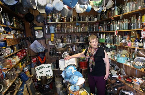 Near Portage La Prairie, Manitoba- Vivian Proden owns Junk for Joy just East of  Portage La Prairie, Manitoba on Hyw. #1 - Vivian, 84, is retiring after 34 years in the junk business and is having a 50% off sale starting this Friday- Proden inside her store to preparing for upcoming sale. See Bill Redekop Story- May 13, 2015   (JOE BRYKSA / WINNIPEG FREE PRESS)