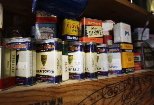 Near Portage La Prairie, Manitoba- Vivian Proden owns Junk for Joy just East of  Portage La Prairie, Manitoba on Hyw. #1 - Vivian, 84, is retiring after 34 years in the junk business and is having a 50% off sale starting this Friday- Selection of old spice tins for sale. See Bill Redekop Story- May 13, 2015   (JOE BRYKSA / WINNIPEG FREE PRESS)