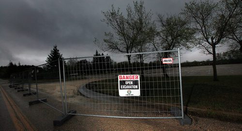 Temporary signage and fence marks unfinished construction at Bird's Hill Park Thursday as the first big camping and parks weekend of the season is expected to be gloomy and cold. See story. May 14, 2015 - (Phil Hossack / Winnipeg Free Press)