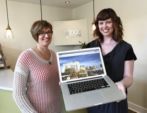 At left, Tannis Engel and Susan McAllister  co-owners of Ethos Realty showing the Navut homepage for searching Winnipeg. Navut Realty, a Montreal-based company that has just launched a website in town to help match people up with the neighbourhoods where they should live, ie proximity to schools, crime rates, etc. They have linked up with Ethos Realty for this service. Geoff Kirbyson story   Wayne Glowacki / Winnipeg Free Press May 15 2015