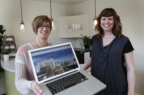 At left, Tannis Engel and Susan McAllister co-owners of Ethos Realty showing the Navut homepage for searching Winnipeg. Navut Realty, a Montreal-based company that has just launched a website in town to help match people up with the neighbourhoods where they should live, ie proximity to schools, crime rates, etc. They have linked up with Ethos Realty for this service. Geoff Kirbyson story   Wayne Glowacki / Winnipeg Free Press May 15 2015