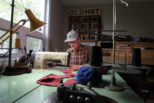 49.8 Feature.  Local hat maker, Nathan Dueck started a hat making company called, oldhat (old hat). He takes second-hand or recycled material and makes cadet, little brits and 5 panel hats and sells them online and at festivals.   See Dave Sanderson story.  May 14, 2015 Ruth Bonneville / Winnipeg Free Press