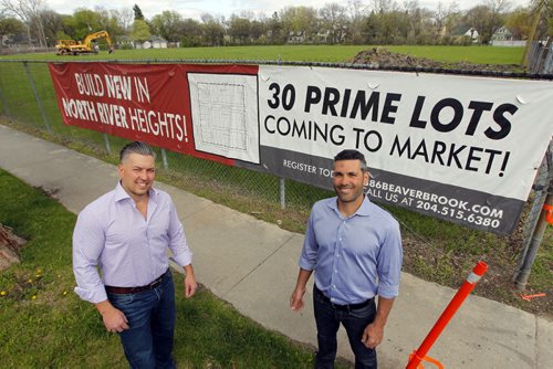 l-r RYAN SKRABYK and TONY BAGNULO, co-developers of 386 Beaverbrook, a new 30-home, infill housing development to be built on the former Sir John Franklin school property. Lots are to go on sale June 1 but they already have some heavy equipment on the site. To go with Tuesdays commercial real estate column.. BORIS MINKEVICH/WINNIPEG FREE PRESS May 15, 2015