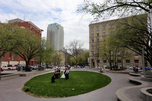 Candace Brodeur and Duane Gitzel have wedding photos taken by Krista Anderson in Old Market Square, Saturday, May 16, 2015. (TREVOR HAGAN/WINNIPEG FREE PRESS)