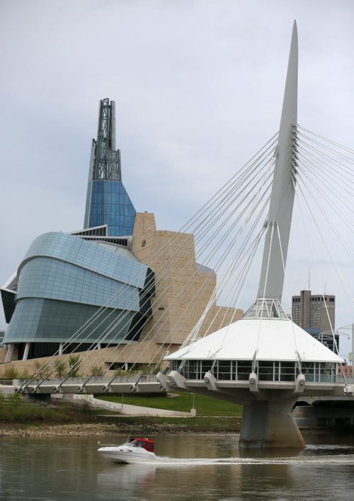 A boat on the Red River near the Esplanade Riel, Canadian Museum for Human Rights and The Forks, Saturday, May 16, 2015. (TREVOR HAGAN/WINNIPEG FREE PRESS)