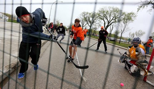 A member of the Sunnyvale Stars fires a shot against the Sunova Beaches during the Play On! 4 on 4 Street Hockey Tournament at the University of Manitoba, Sunday, May 17, 2015. (TREVOR HAGAN/WINNIPEG FREE PRESS)