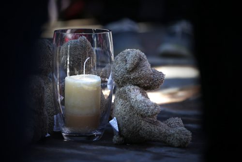 May 18, 2015 - 150518  -  Little bears and a candle were placed for Teresa Robinson. On Monday, May 18, 2015 people gathered at the Oodena Circle at the Forks for a vigil for Teresa Robinson, an even year old who was killed on first nation community of Garden Hill. John Woods / Winnipeg Free Press