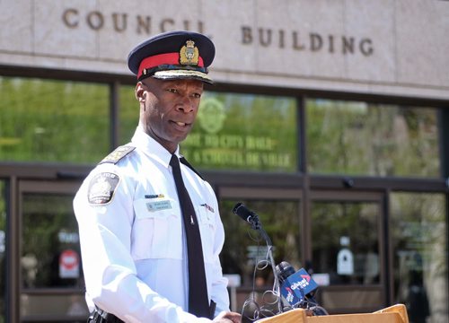 Winnipeg Police Chief Devon Clunis and Winnipeg City Councillor Scott Gillingham (not pictured), Chair of the Winnipeg Police Board, announce the 2015-2019 Winnipeg Police Service Strategic Plan outside City Hall Tuesday afternoon.  150519 May 19, 2015 Mike Deal / Winnipeg Free Press