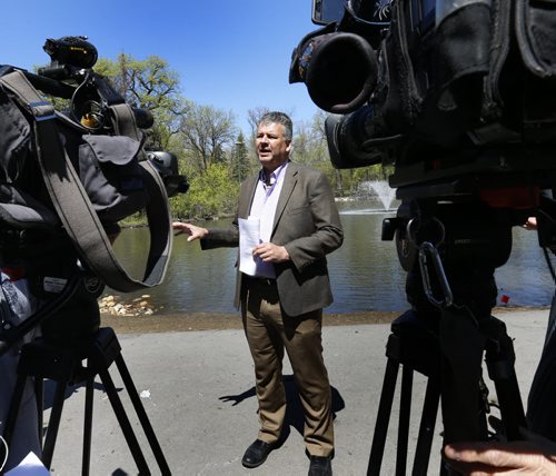 Ken Nawolsky, Superintendent of Insect Control gives an update to media in the St. Vital Park Tuesday.   Kristin Annable story Wayne Glowacki / Winnipeg Free Press May 19 201
