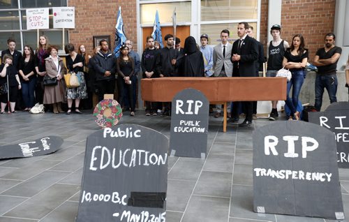 About 50 students and staff held a rally with a mock funeral including the grim reaper in the engineering atrium at University of Manitoba Tuesday against budget cuts just before the board of governors met. ¤ Nick Martin story¤ Wayne Glowacki / Winnipeg Free Press May 19 2015