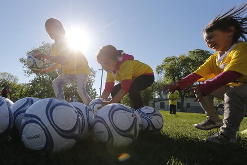 May 19, 2015 - 150519  -  Girls take part in a soccer program that encourages participation by inner-city girls Tuesday, May 19, 2015. John Woods / Winnipeg Free Press