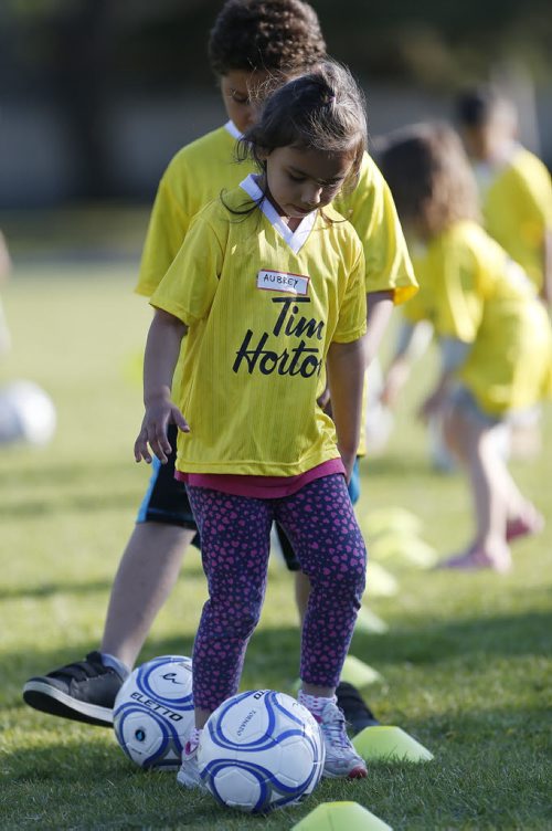May 19, 2015 - 150519  -  Aubrey Sanderson takes part in a soccer program that encourages participation by inner-city girls Tuesday, May 19, 2015. John Woods / Winnipeg Free Press