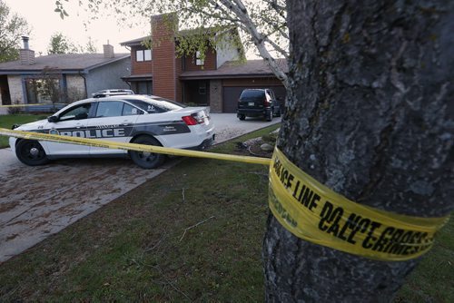 May 19, 2015 - 150519  -  Police were on the scene at 9 Cheltenham Cove, the scene of Winnipeg's latest homicide, Tuesday, May 19, 2015. John Woods / Winnipeg Free Press