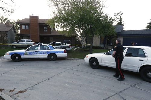 May 19, 2015 - 150519  -  Police were on the scene at 9 Cheltenham Cove, the scene of Winnipeg's latest homicide, Tuesday, May 19, 2015. John Woods / Winnipeg Free Press