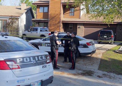 LOCAL-NEWS- Police were on the scene at 9 Cheltenham Cove Tuesday night investigating a homicide. BORIS MINKEVICH/WINNIPEG FREE PRESS May 20, 2015
