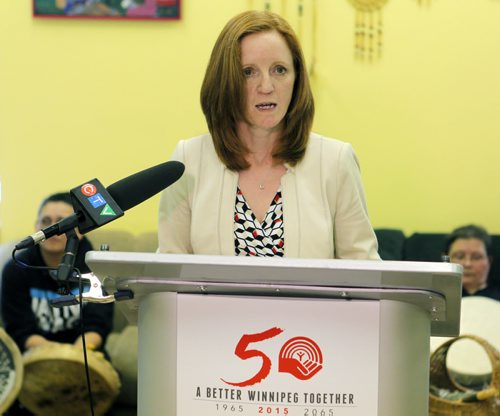 Crowdfunding at the United Way press conference. Make it Happen drive. Media event at the North Main Women's Centre. Kevin Rollason story. Volunteer Chair of United Way's 50th Anniversary Committee Ayn Wilcox speaks. BORIS MINKEVICH/WINNIPEG FREE PRESS May 20, 2015