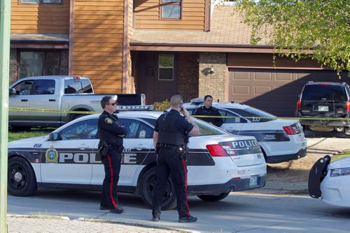 LOCAL-NEWS- Police were on the scene at 9 Cheltenham Cove Tuesday night investigating a homicide. BORIS MINKEVICH/WINNIPEG FREE PRESS May 20, 2015