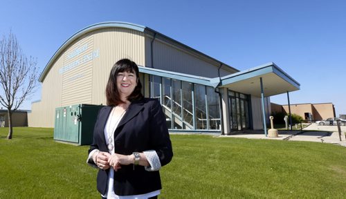 Peggy May, CEO Southport Aerospace Inc. by the Southport Recreation Centre. It is part of a renovation project and will be  re-named the Central Plains Recplex.   Martin Cash story. Wayne Glowacki / Winnipeg Free Press May 20 2015