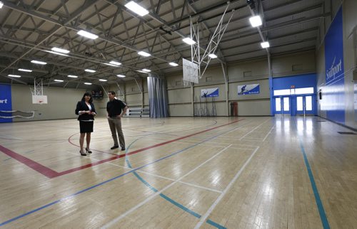 Peggy May, CEO Southport Aerospace Inc. with Mike Knox, Project Manager in the Southport Recreation Centre near Portage la Prairie. The existing building is soon to have the gym floor redone and will become part of the Central Plains Recplex.    Martin Cash story. Wayne Glowacki / Winnipeg Free Press May 20 2015