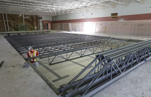The swimming pool at Southport has been shut down for years and now a floor is being installed over the pool for a cardio/weight room and a running track. This will be part of the Central Plains Recplex at Southport near Portage la Prairie.    Martin Cash story. Wayne Glowacki / Winnipeg Free Press May 20 2015