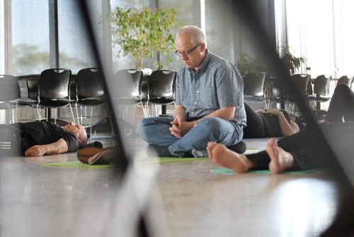 Biz :Story about reducing the stigma of mental health issues in the workplace. Employees at National Leasing take part in a 45- minute meditation class over their lunch hour which is part of a series of programming initiatives this week in honour of Mental Illness month.   May 20, 2015 Ruth Bonneville / Winnipeg Free Press