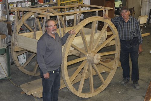 025 - Paul Barnabe, left, and Leonard Pappel, of Emerson, and their Red River Oxcart. BILL REDEKOP/WINNIPEG FREE PRESS May 15, 2015