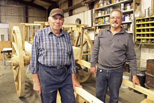 015 - Leonard Pappel, forground, and Paul Barnabe, or Emerson, and their Red River Oxcart. BILL REDEKOP/WINNIPEG FREE PRESS May 15, 2015