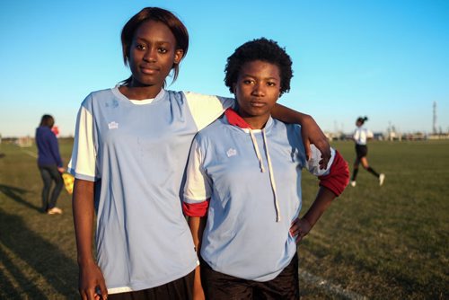The Immigrant and Refugee Community Organization of Manitoba "IRCOM" Cobras under-16 girls soccer team playing the West St. Paul Stars U-16 team Wednesday evening. Attio (left) and Dima (right). 150520 - Wednesday, May 20, 2015 -  (MIKE DEAL / WINNIPEG FREE PRESS)