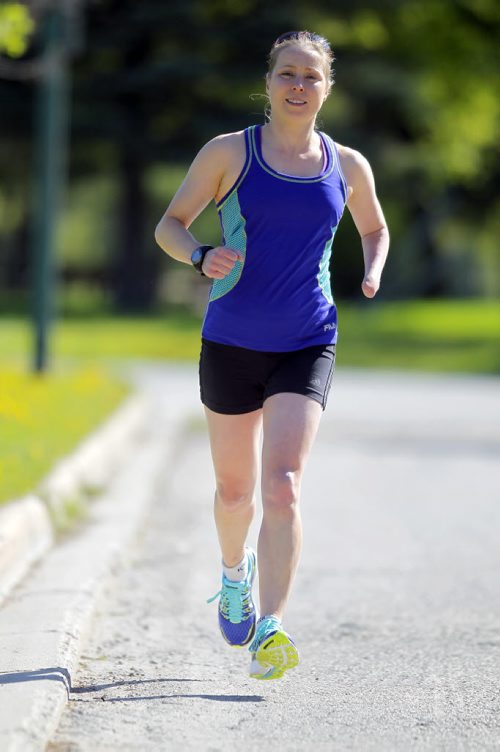 TRAINING BASKET - Chantal Givens is a paratriathlon athlete who has won the Canadian national championships the past three years in a row and is working on going to the Paralympic Games in Brazil in 2016. BORIS MINKEVICH/WINNIPEG FREE PRESS May 21, 2015