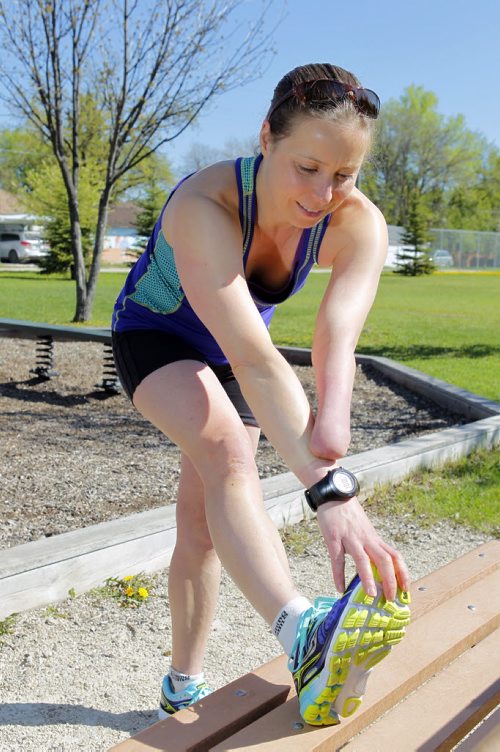 TRAINING BASKET - Chantal Givens is a paratriathlon athlete who has won the Canadian national championships the past three years in a row and is working on going to the Paralympic Games in Brazil in 2016. BORIS MINKEVICH/WINNIPEG FREE PRESS May 21, 2015
