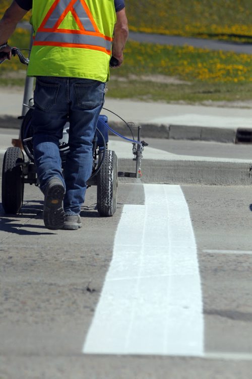 49.8 - Road lines being painted by a City of Winnipeg crews on Pembina and University Crescent. BORIS MINKEVICH/WINNIPEG FREE PRESS May 21, 2015