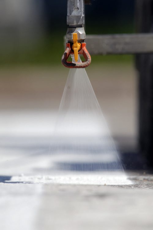 49.8 - Road lines being painted by a City of Winnipeg crews on University Crescent near the stadium. BORIS MINKEVICH/WINNIPEG FREE PRESS May 21, 2015