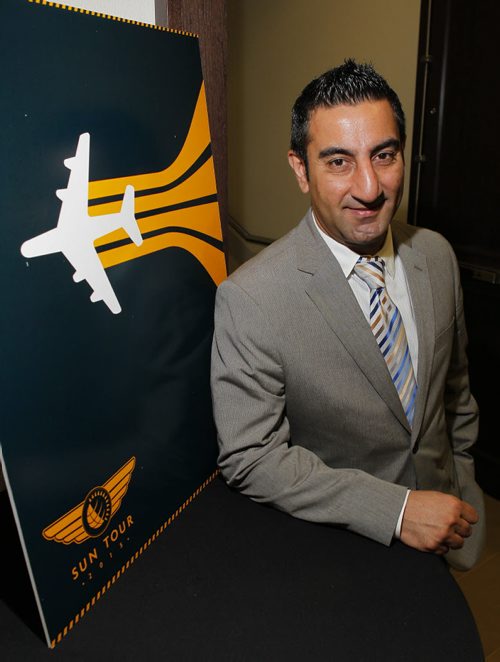 BIZ - Sun Life Global Investments Chief Investment Officer Sadiq S. Adatia poses for a photo in Winnipeg at a south Pembina Highway hotel. BORIS MINKEVICH/WINNIPEG FREE PRESS May 21, 2015