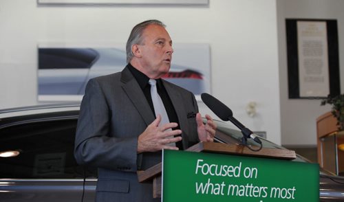 Consumer Protection Minister Ron Lemieux talks to the media about the new advertising rules that will be put into place as of June 1st to help protect buyers at Birchwood Toyota, Pointe West Auto Park Thursday.  See Bruce Owen's story.    May 21, 2015 Ruth Bonneville / Winnipeg Free Press