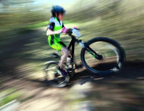 PHOTO FEATURE - Racing is a blur during the "kids" portion of the Wednesday evening mountain bike races at Birds Hill Bird's Hill Park. May 20, 2015 - (Phil Hossack / Winnipeg Free Press)