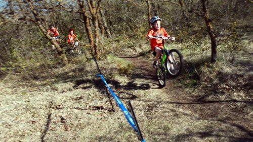 PHOTO FEATURE - Young riders head out on the race trail in the "kids" portion of the Wednesday evening mountain bike races at Birds Hill Bird's Hill Park. May 20, 2015 - (Phil Hossack / Winnipeg Free Press)