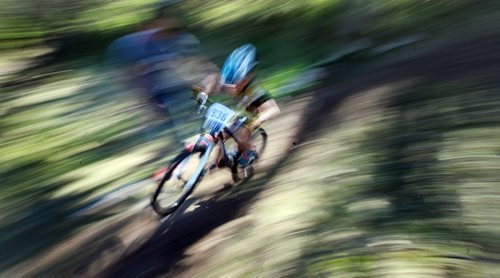 PHOTO FEATURE - A rider in the "kids" portion of the Wednesday evening mountain bike races at Birds Hill Bird's Hill Park manouvres a technical corner. May 20, 2015 - (Phil Hossack / Winnipeg Free Press)
